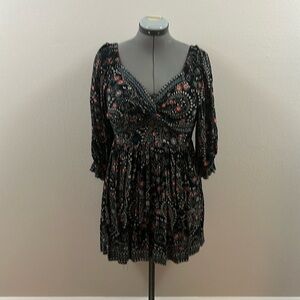 Black Angie Boho Dress with white orange & blue floral pattern.